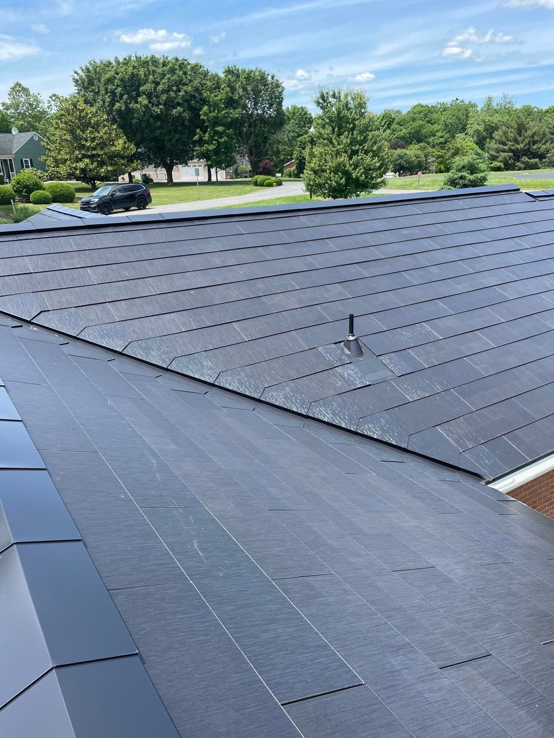 Tesla Solar Roof Installation by American Home Contractors