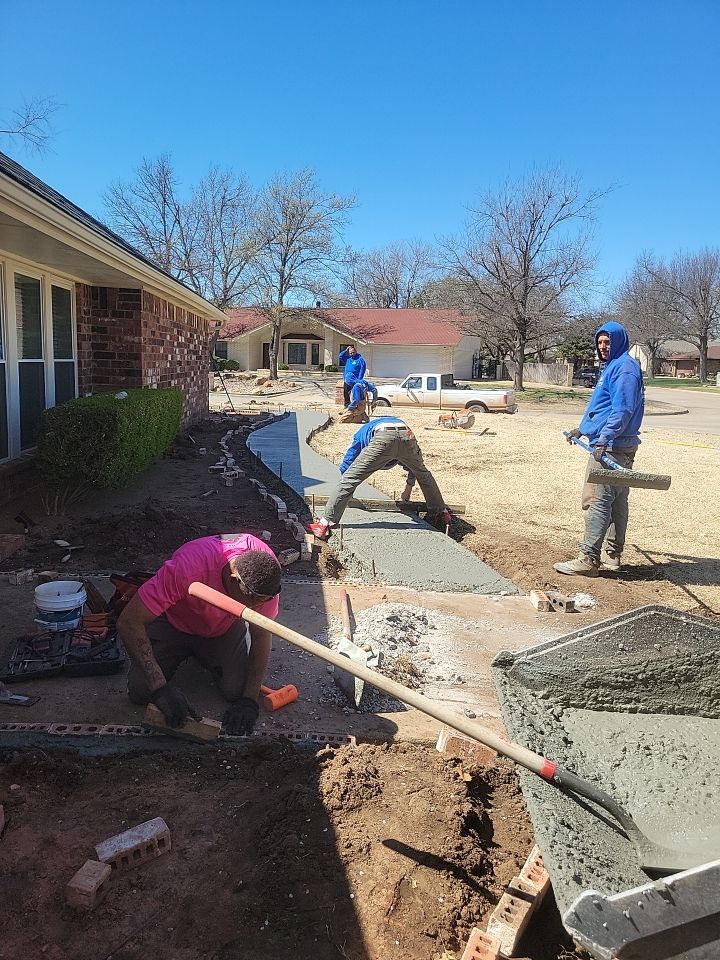 Concrete sidewalk using Concrete by Clays Services Inc