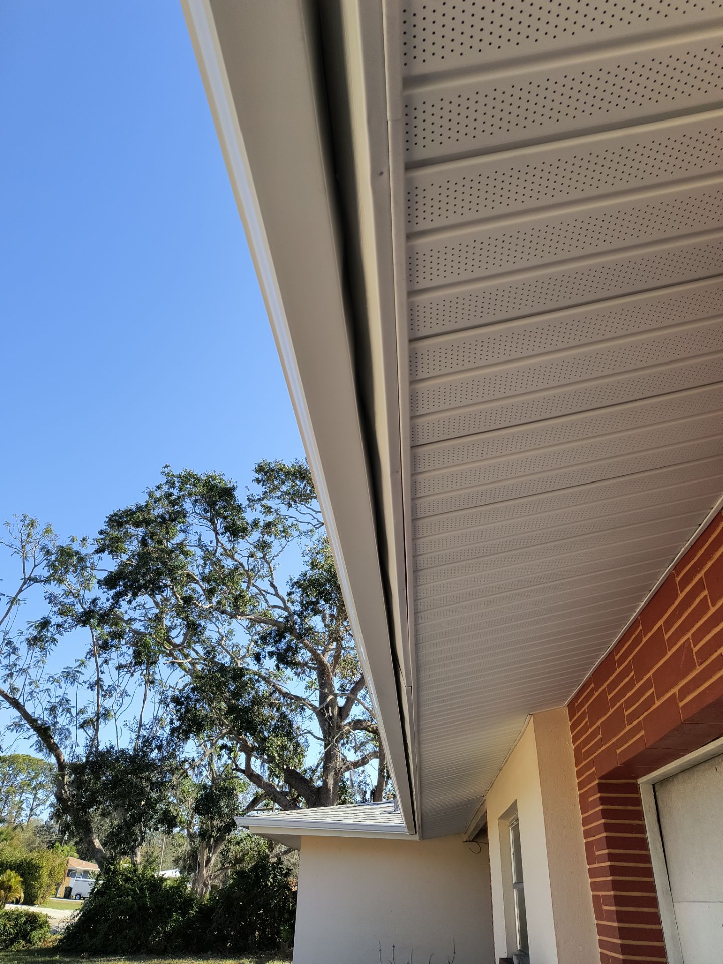 White Soffit and Fascia Upgrade in Sarasota FL by Gutter Professors