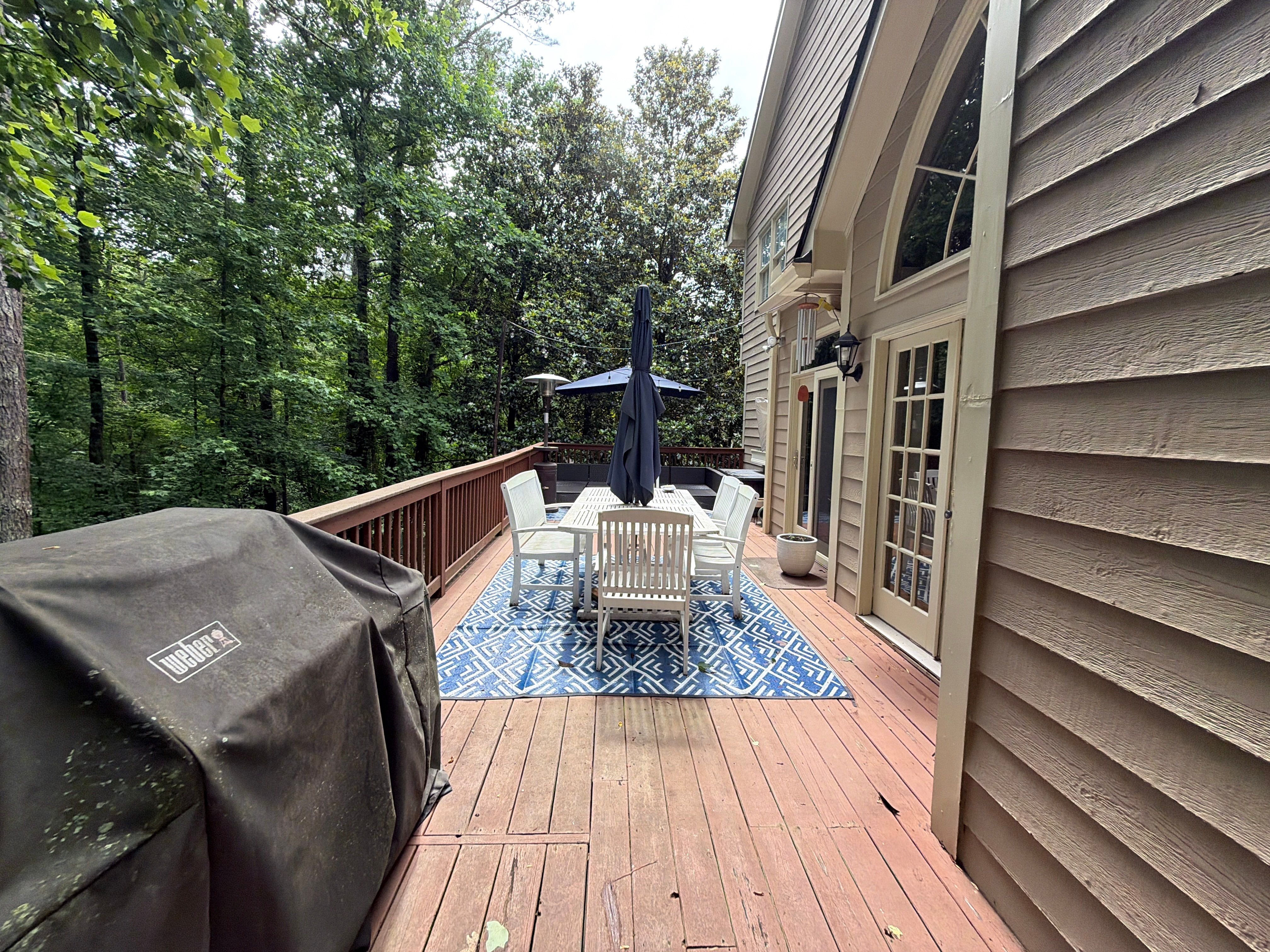 Full James Hardie Siding Replacement and Trex Deck Resurface in the Saddle Color by Nelson Exteriors 