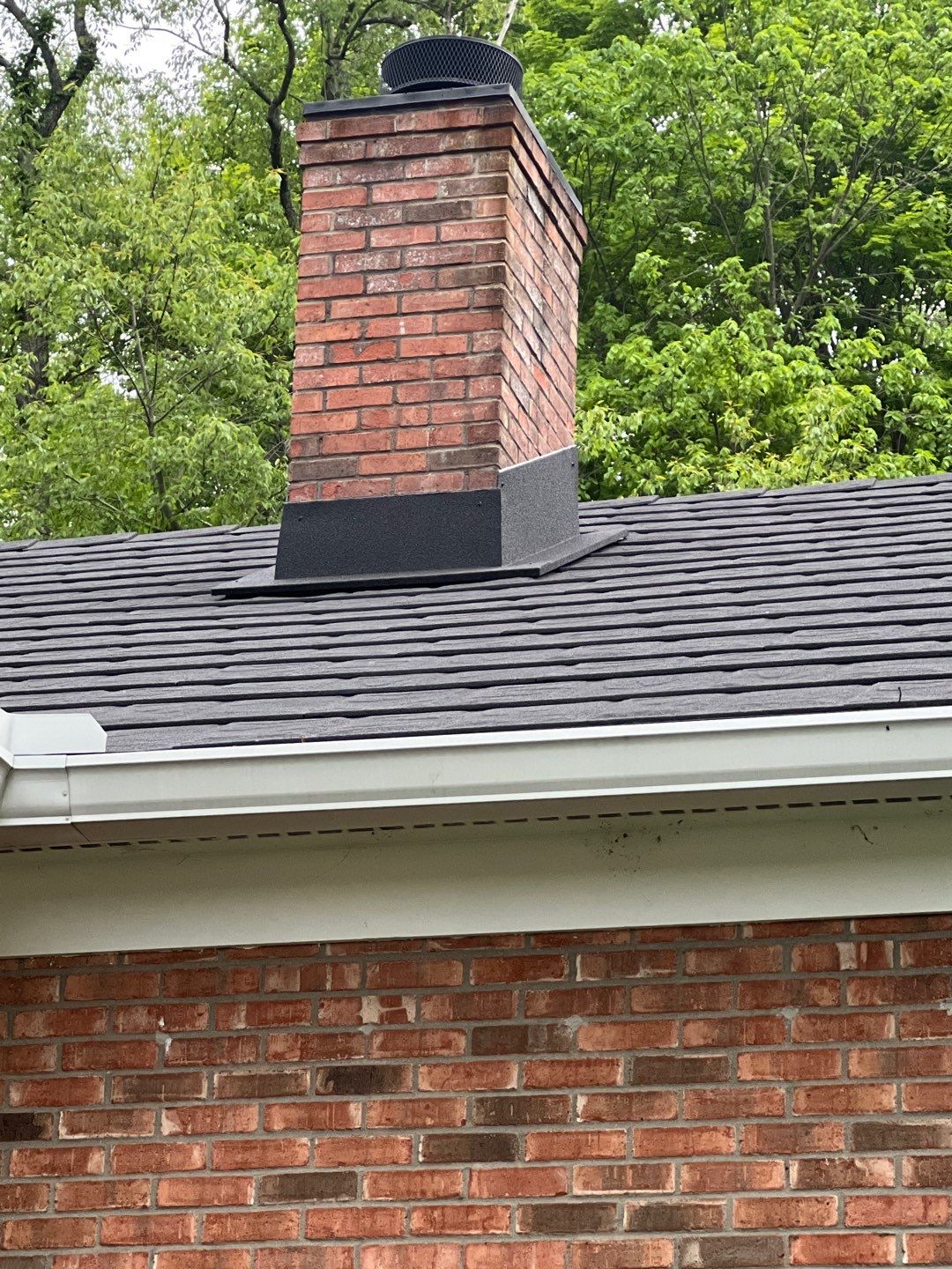 Residential Roofing Repair using Chimney counter flashing by Nitro Roofing and Construction