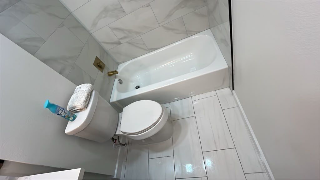 Houston Bathroom Renovation Featuring Custom Wood Slats by Rolling Nations