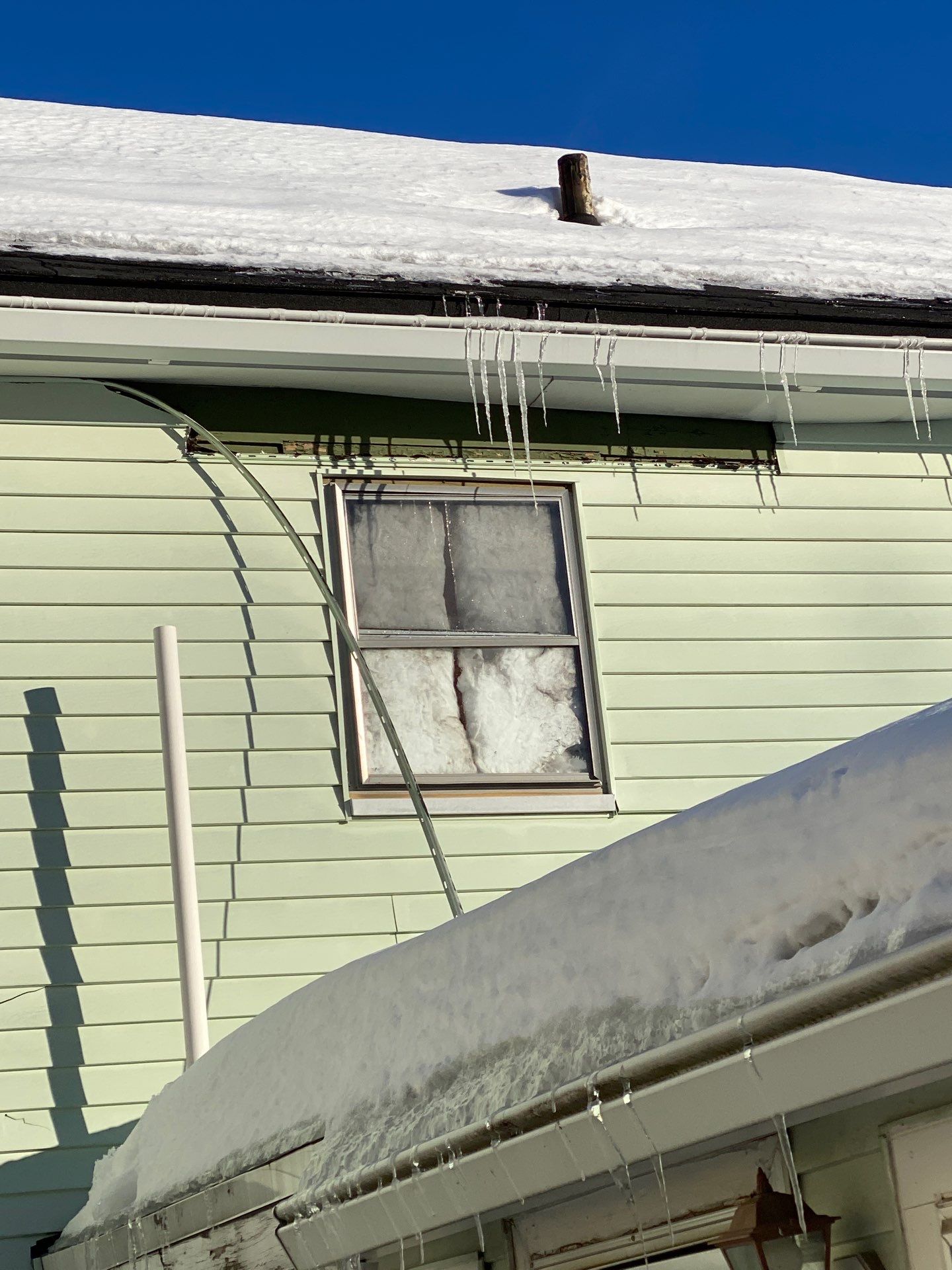 Vinyl Siding Repair & Replacement in Lowell, MA by Mighty Dog Roofing of Greater Middlesex County