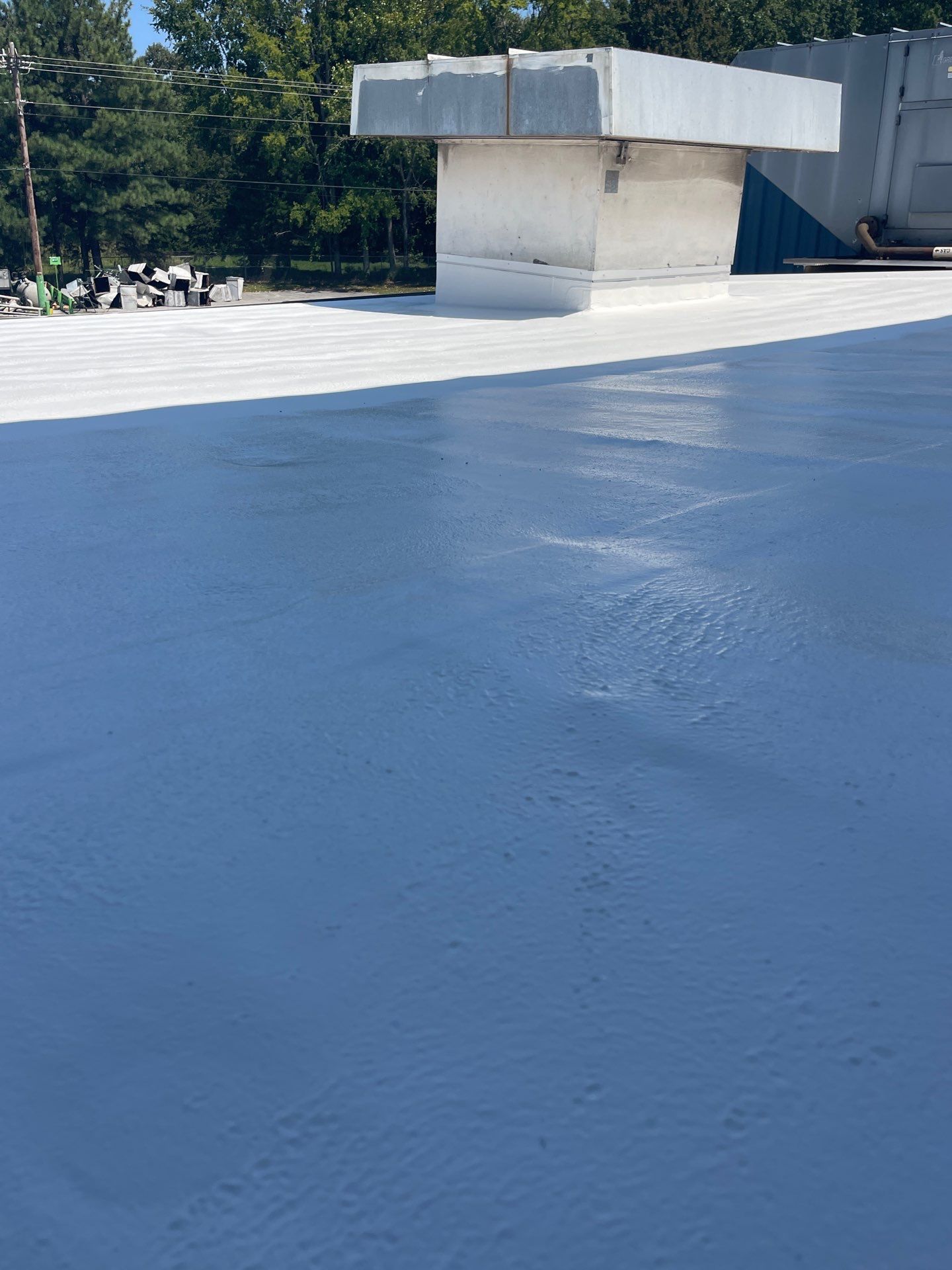 Commercial Roofing Installation using Coatings by Kentucky Commercial Roofing