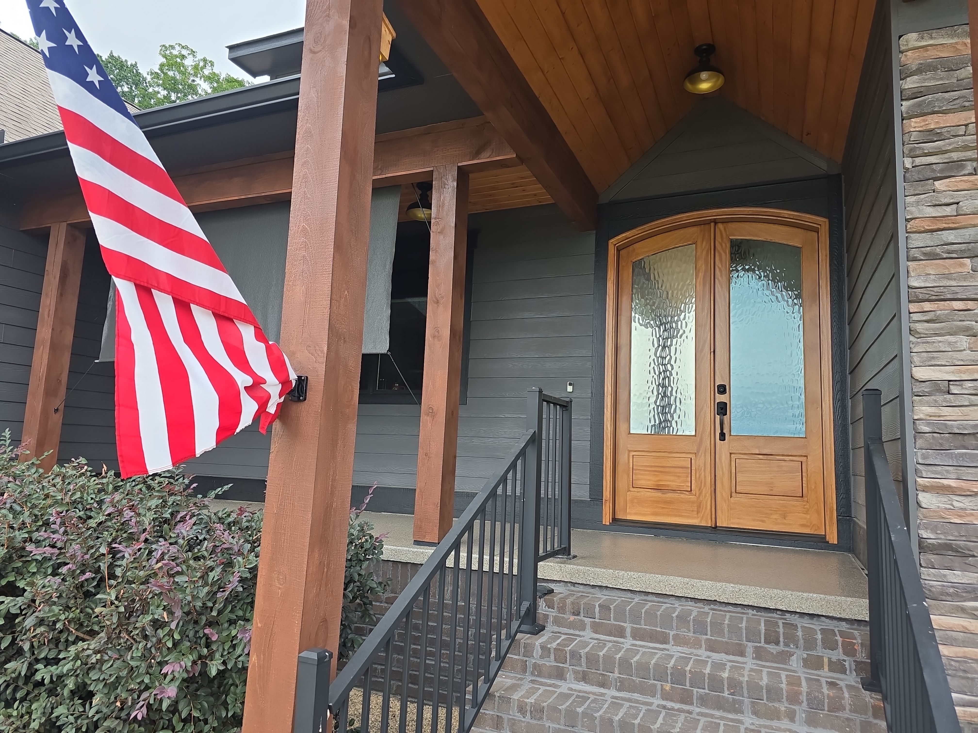 Front Porch and Garage using Obsidian by Elite Floor Solutions