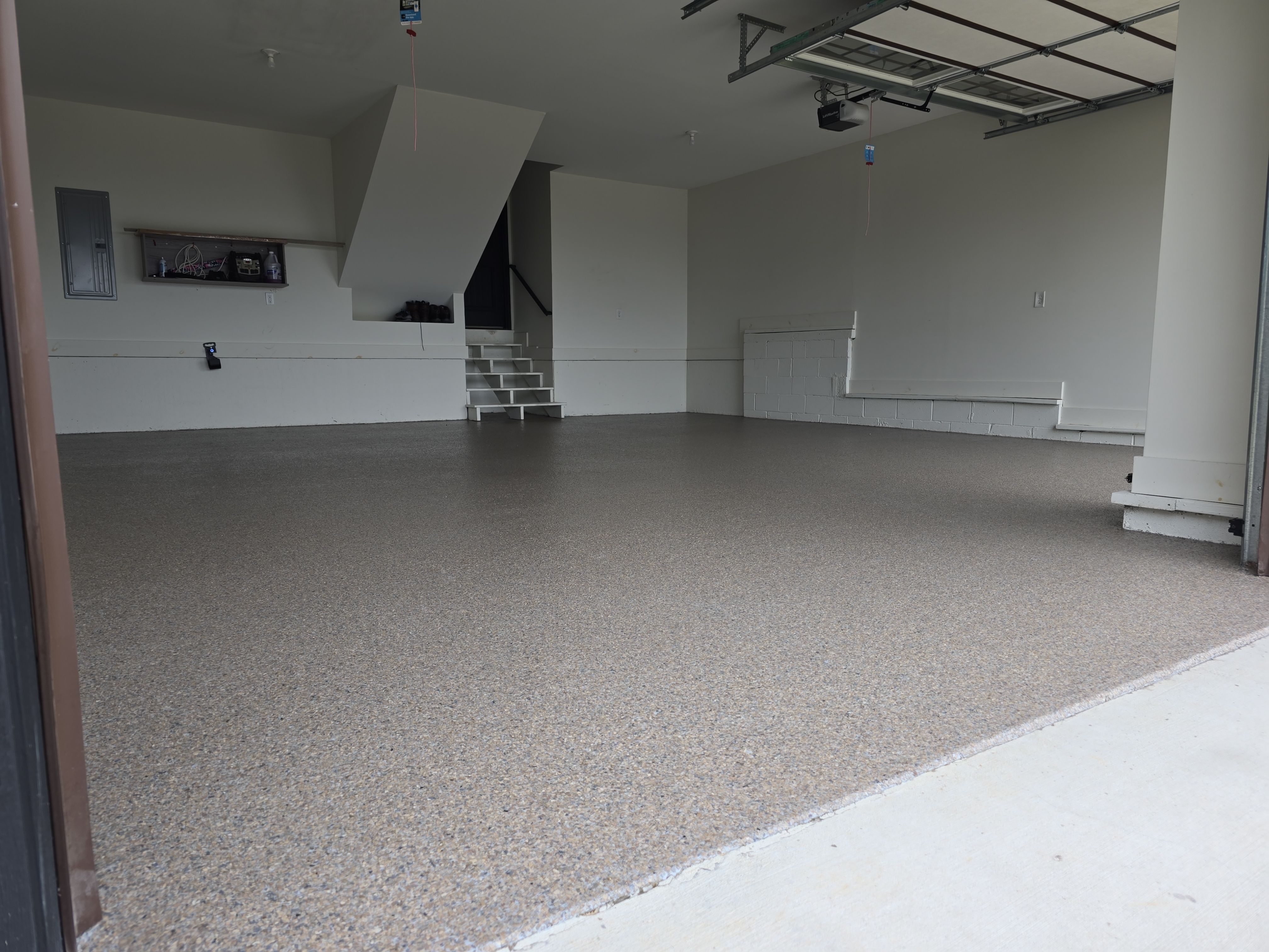 Front Porch and Garage using Obsidian by Elite Floor Solutions