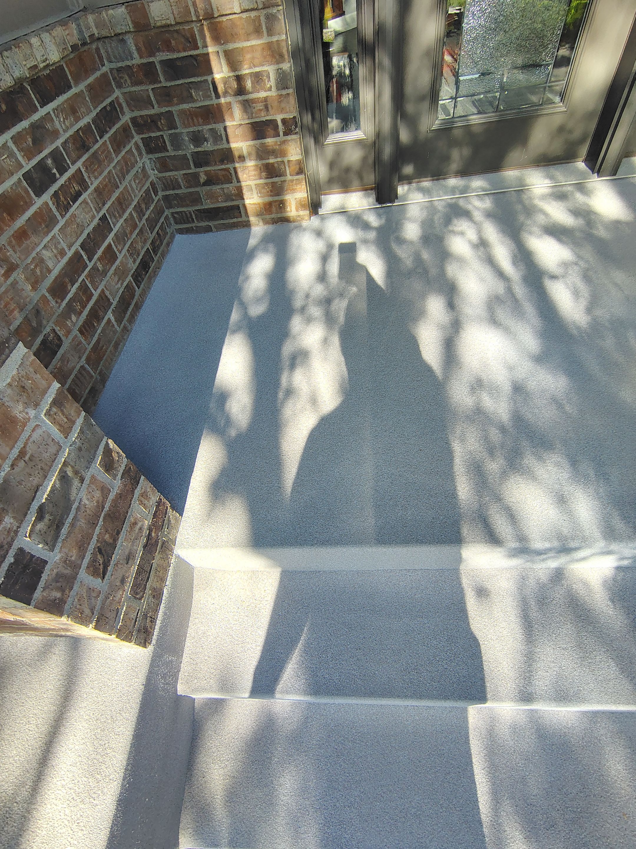 Front Porch Concrete Coating and Restoration in Harrisburg by Select Painting, Coatings & Garage Cabinets
