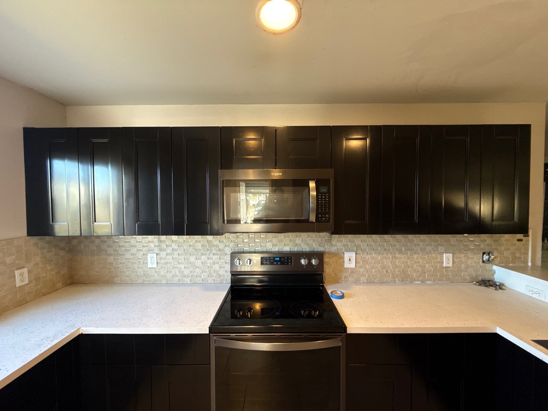 Cabinet Repaint by Fresh Coat Painters