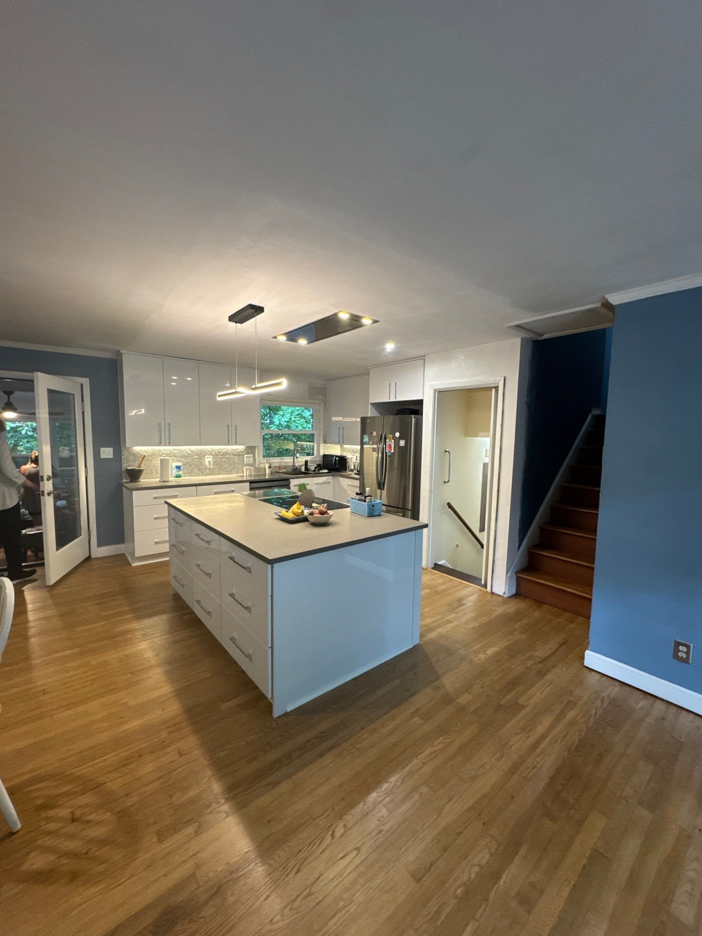 Modern Kitchen Remodeling with Large Central Island in Doraville by Swift Home Renovations