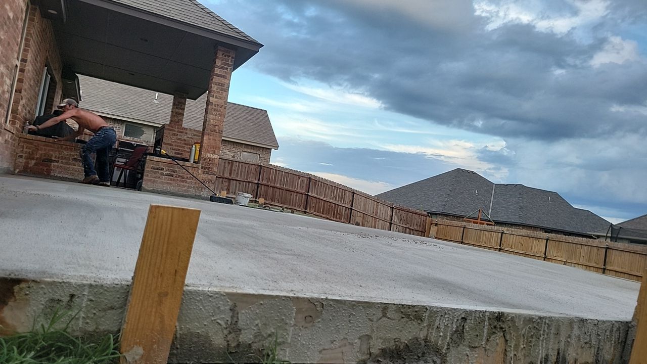 Concrete slab with Pergola by Clays Services Inc
