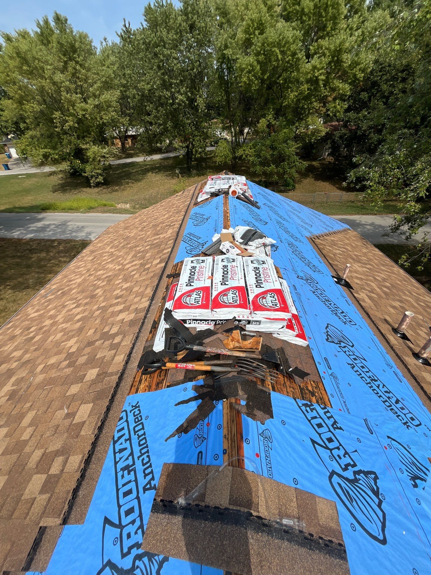 Residential Roofing + Gutters & Downspouts Install  by Titan Commercial & Residential Roofing 