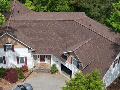 Residential Roofing Installation using  TAMKO Titan XT Rustic Redwood