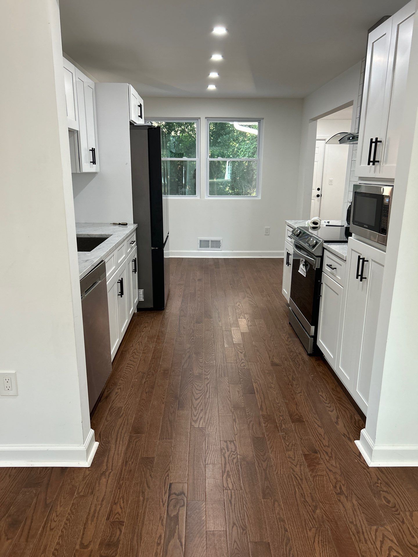 Replaced LVP with timeless solid oak by Footprints Floors of East Atlanta