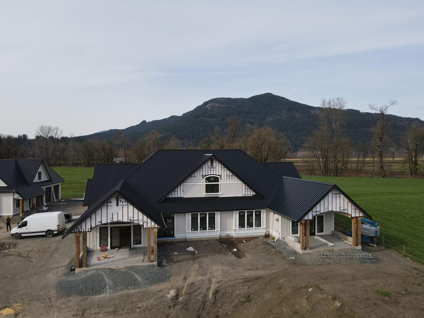 Residential Roofing Installation using 12" Prolok metal  by Top Notch Roofing Inc