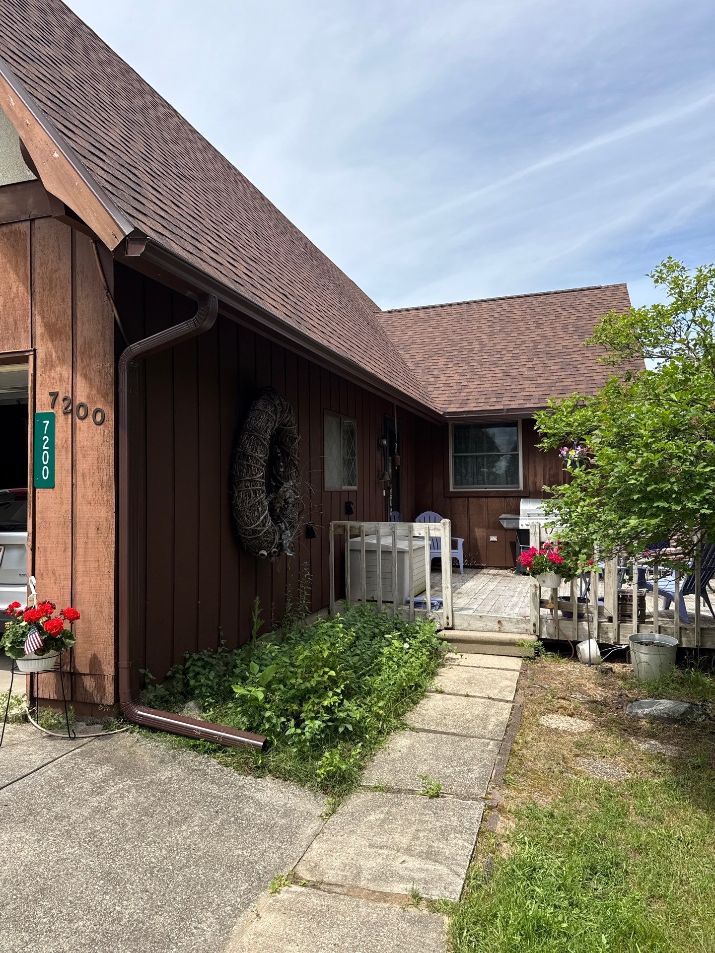 New Gutter and Downspout Installation for Bellaire Residence by Rainbow Seamless Systems