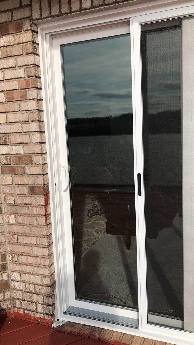 Deck Refurbush and Door Replacement using Trex Decking and Railing. Polaris Patio Doors by Secure Construction Company Inc
