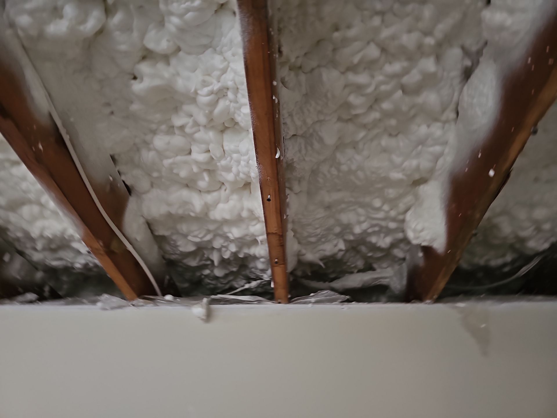 Attic Insulation using open cell spray foam by NYS Foam & Energy