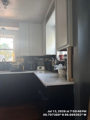 Lincoln Kitchen Remodel Featuring Two-Tone Cabinetry and Quartz Countertops