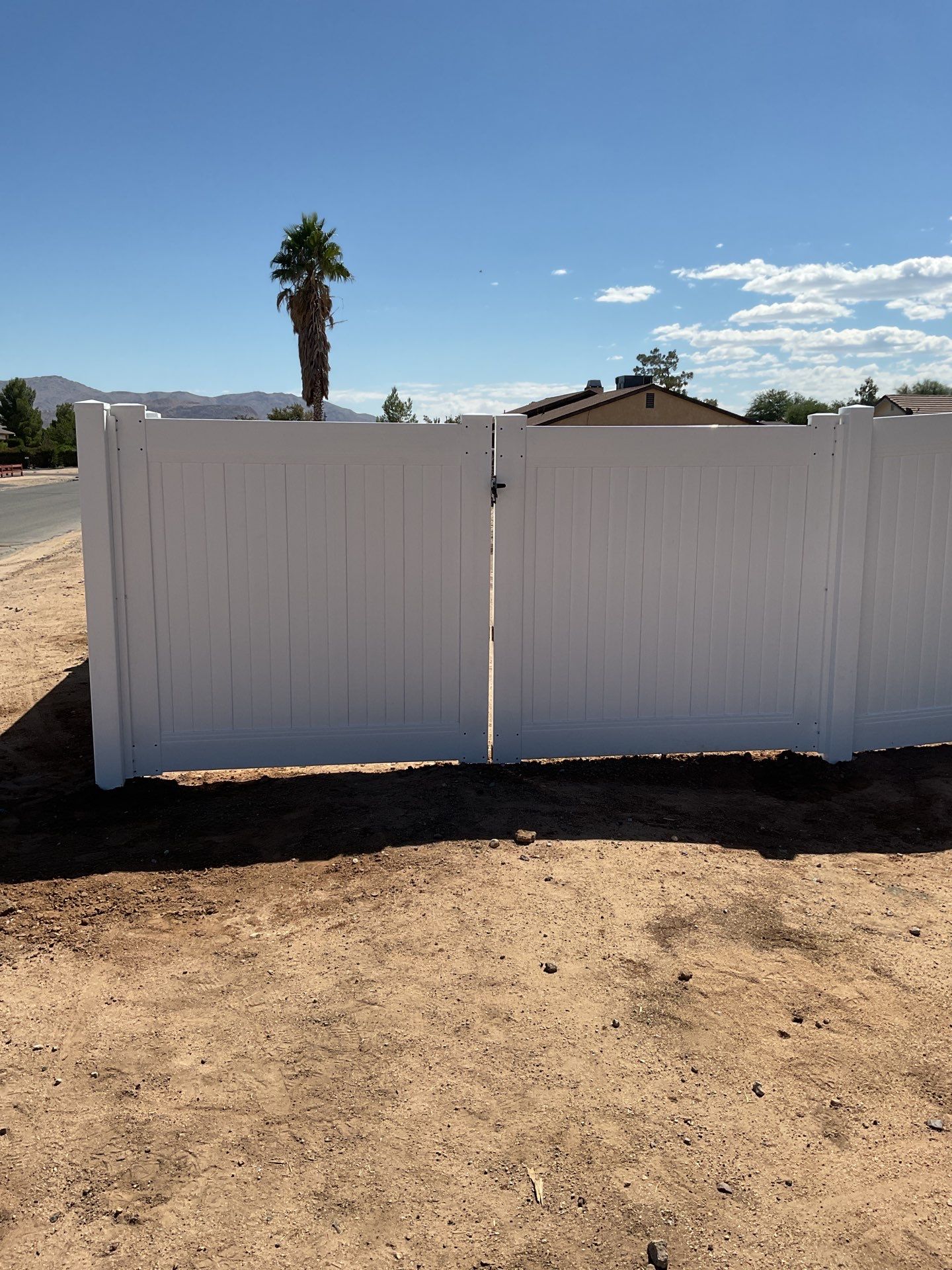 6ft White Privacy Vinyl Fence with Chain-link Fence by Fence Guys Inc.