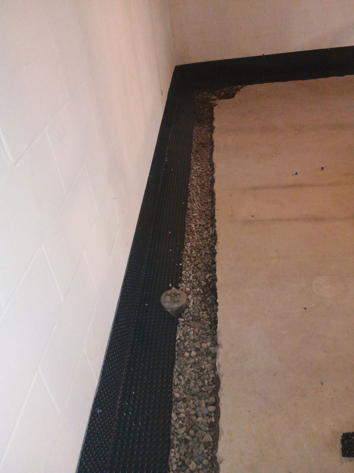 Tying Into an Existing Drain Tile System for Alec by Waterproofing Northeast