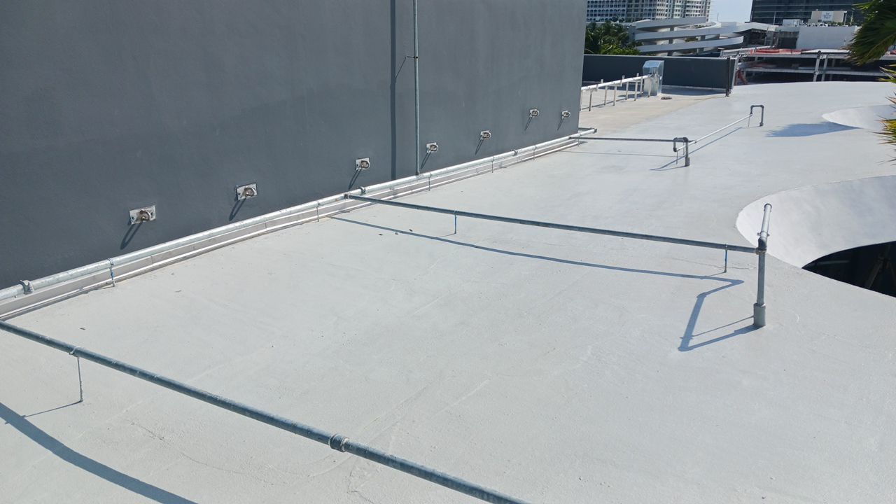 Commercial Rooftop HVAC Support and Perimeter Railing Installation in Bal Harbour by AJF ROOFING INC