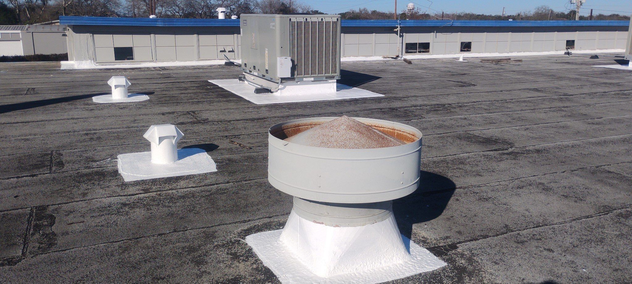 Commercial Silcone Roof Repair using Silcone Coating by Galvan Roofing and Construction