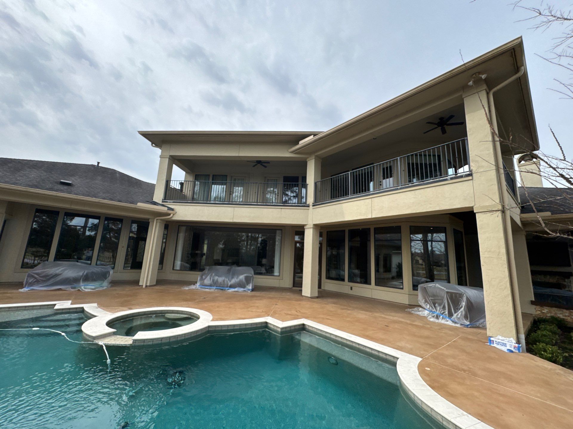 Complete Exterior Painting and Stucco Refinishing in Spring by Rolling Nations