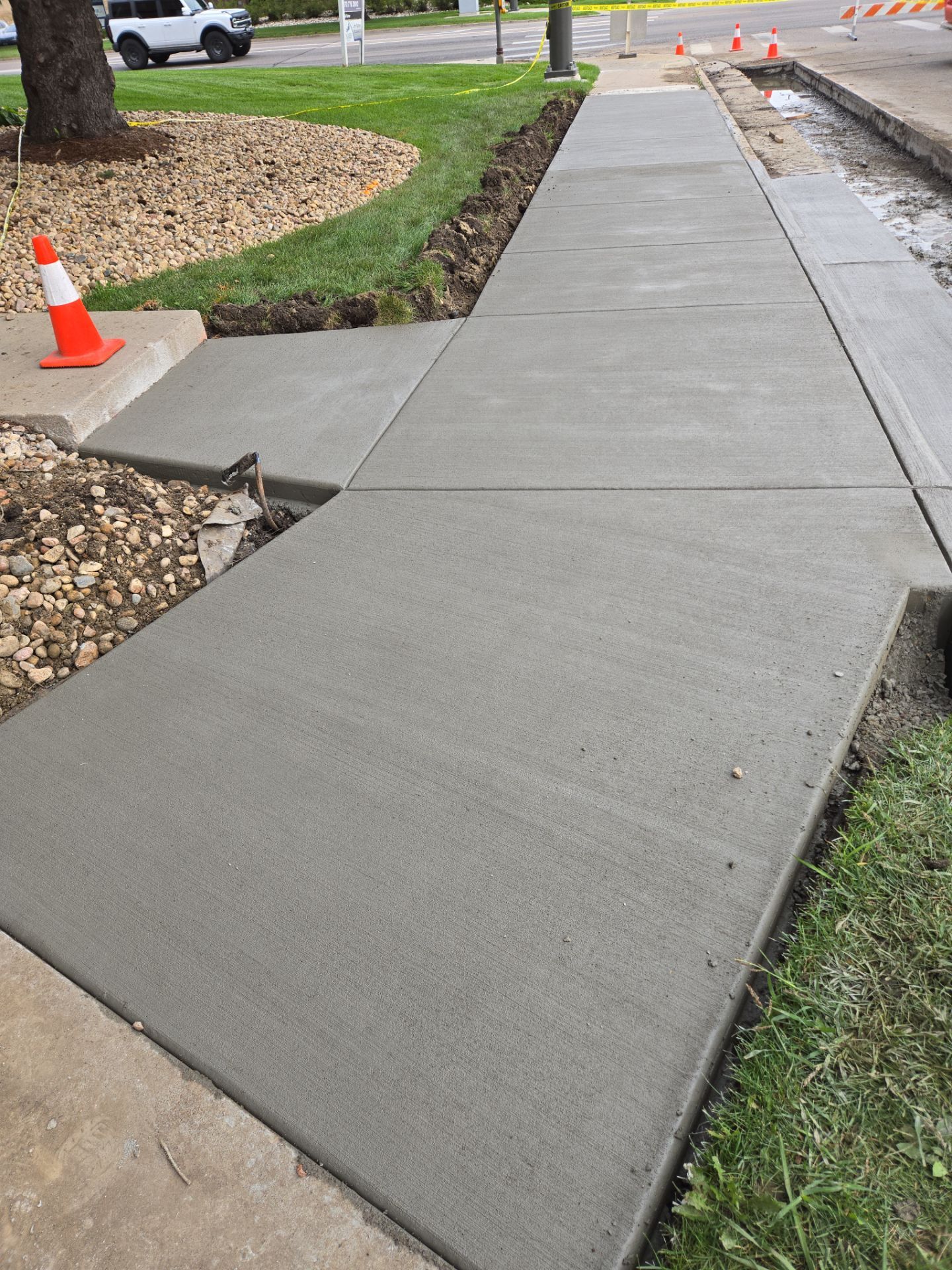 Right of Way work on JFK Blvd in Fort Collins by  Center Line Concrete