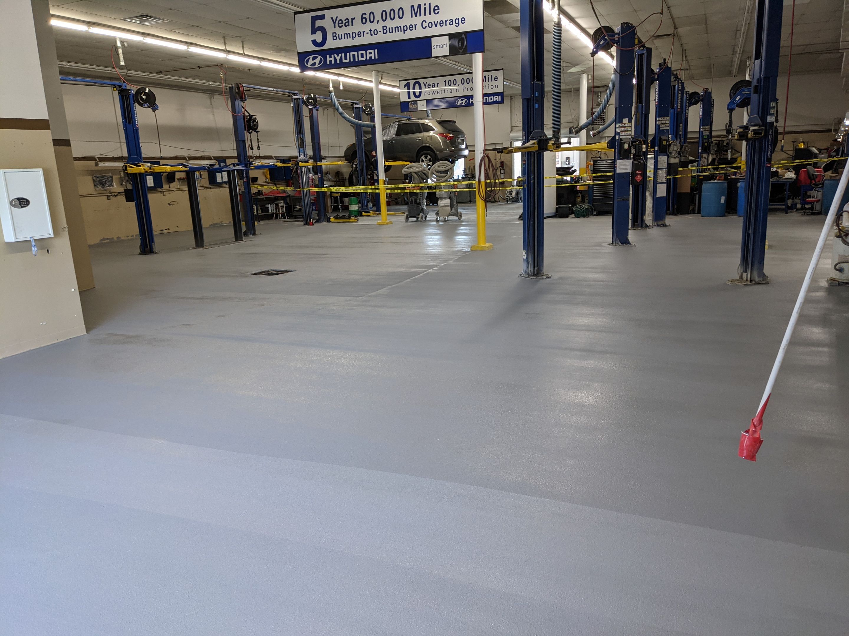 Commercial Floor Transformation using Penntek Shop Floor System by Croc Coatings, LLC