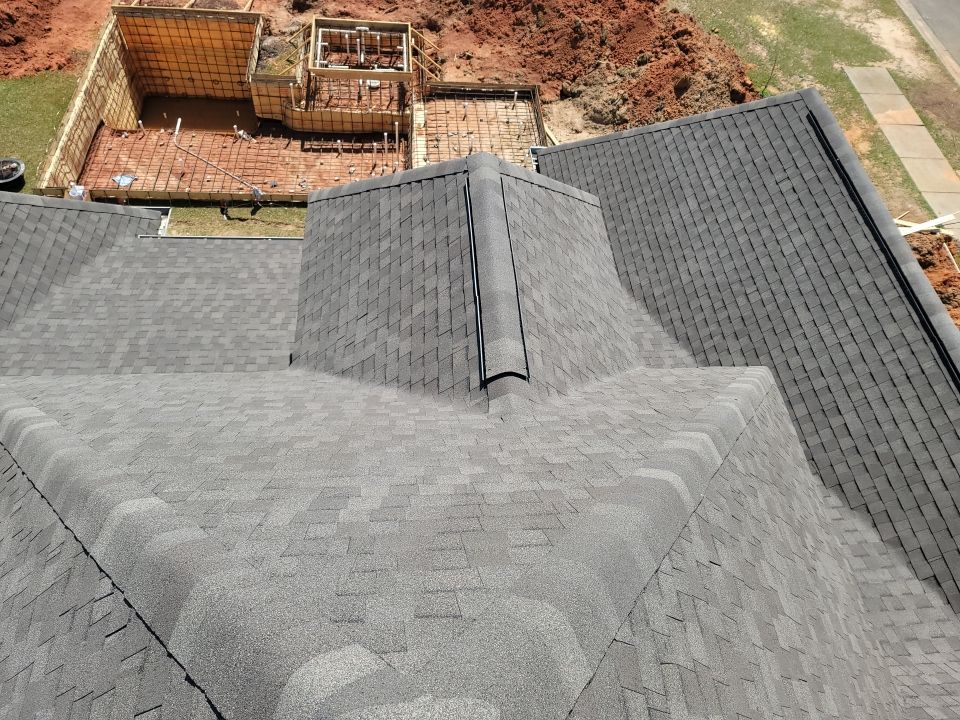 Residential Roofing Installation using Roof Replacement by American Roofing & Construction LLC