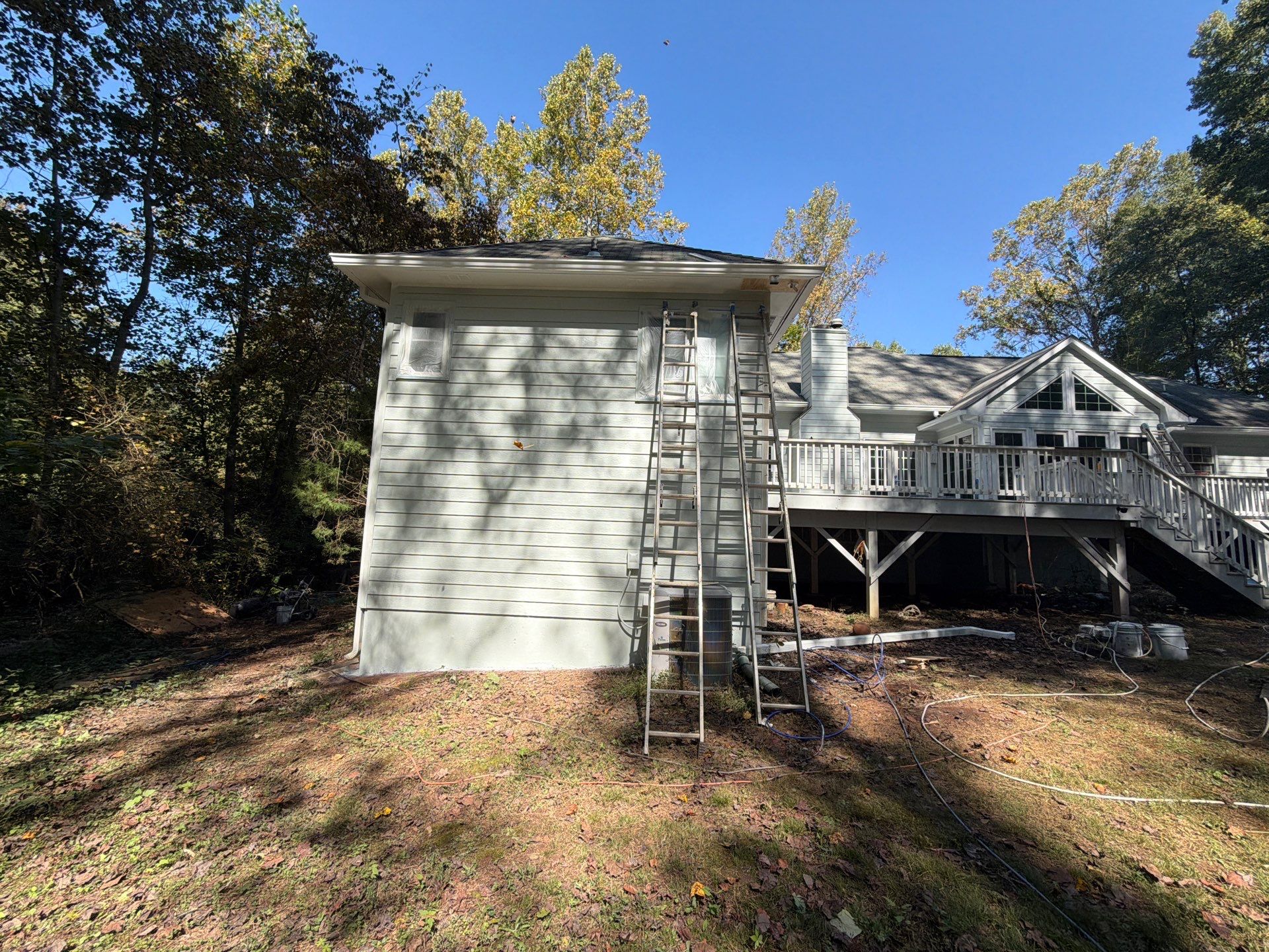Exterior Residential Painting and Deck Refinishing in Canton, Georgia by Swift Home Renovations 