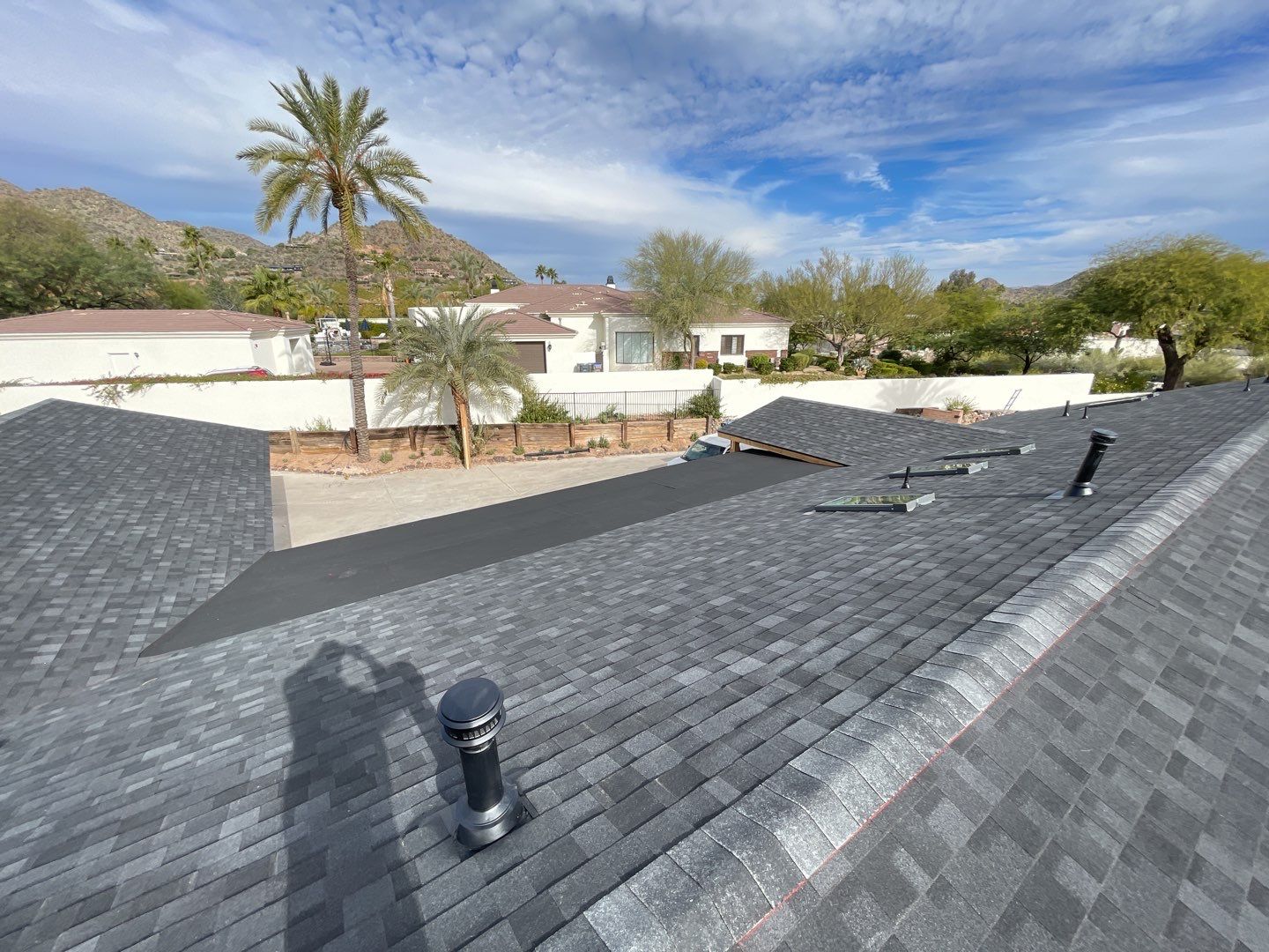 Onyx Black Shingles by Reimagine Roofing