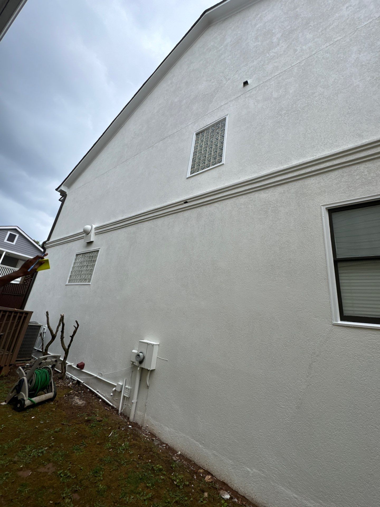 Full Exterior Stucco Painting and Wood Deck Staining in Atlanta by Swift Home Renovations