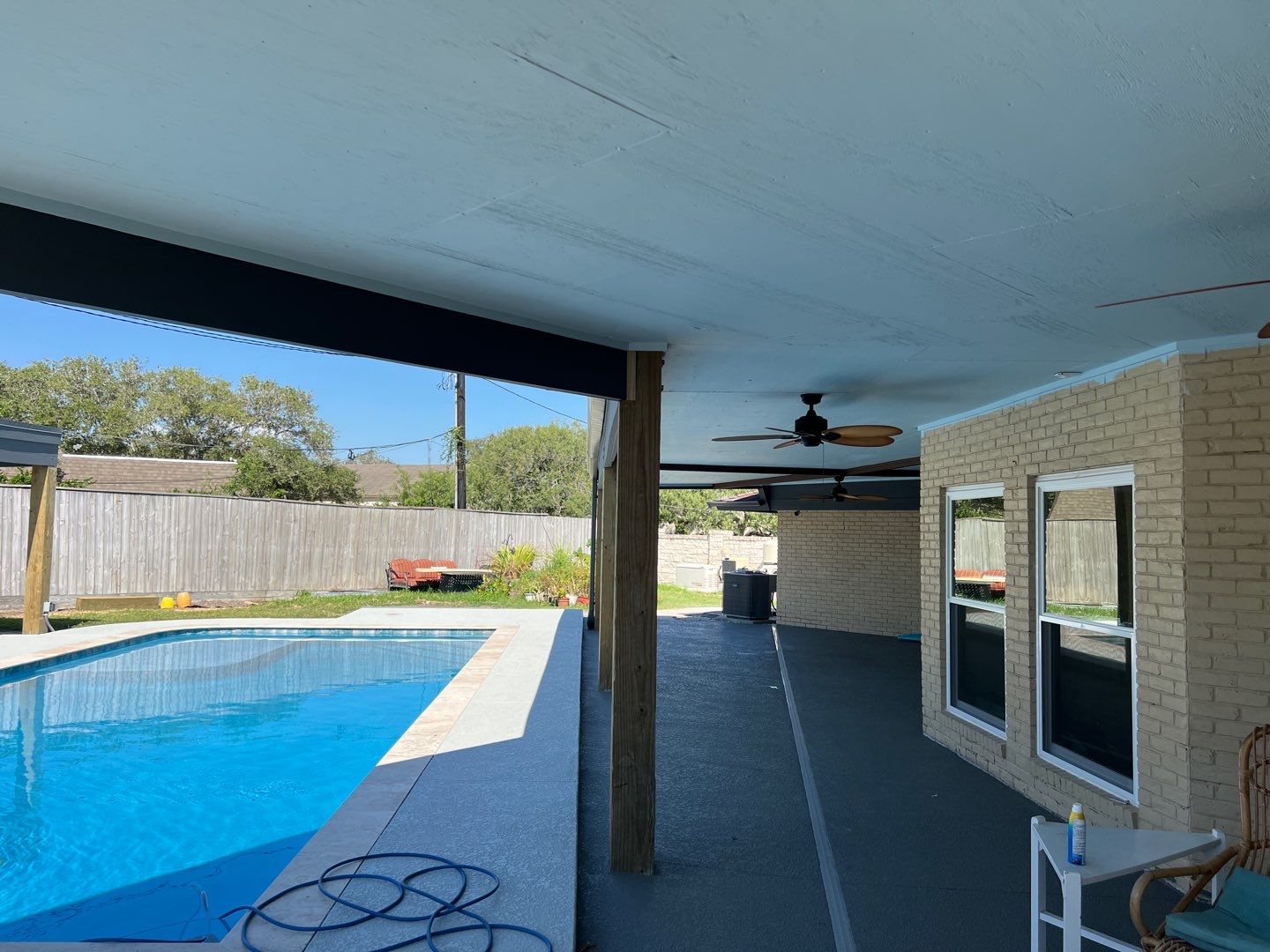 Beautiful pool side build by Bayfront Roofing and Construction