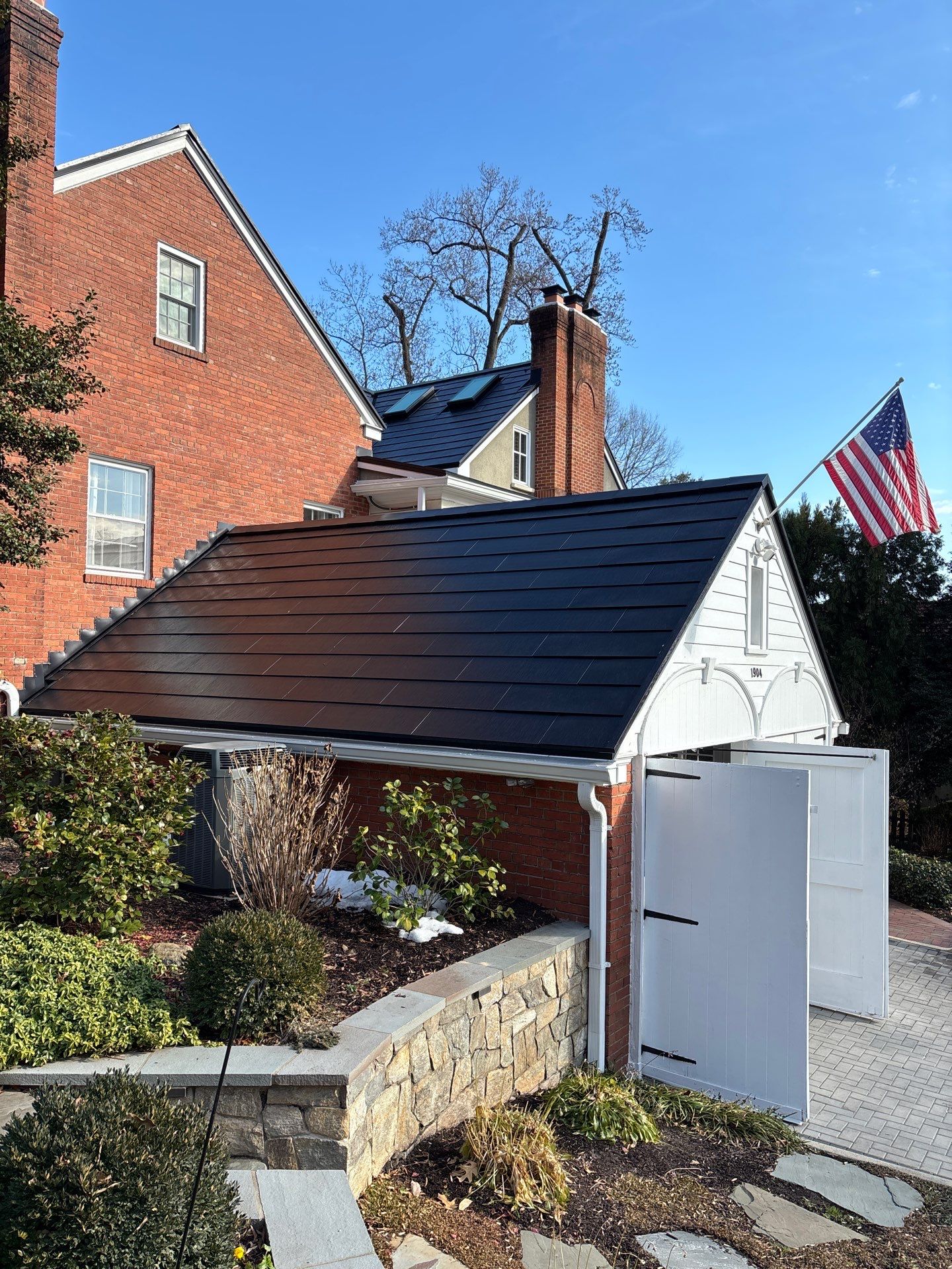 Sleek Tesla Solar Roof + Powerwall Installation | Alexandria, VA by American Home Contractors