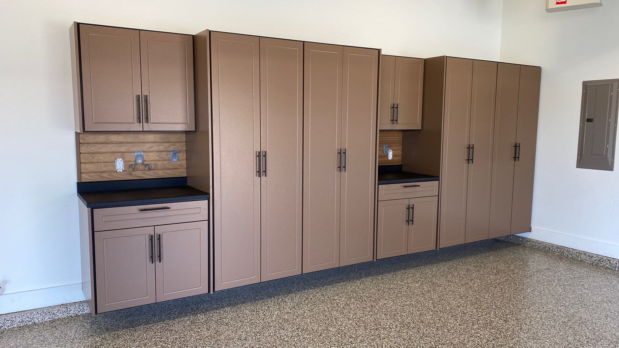 Kenny & Debbie transformed their garage with a Banner Garage Floor and cabinets by Banner Garage