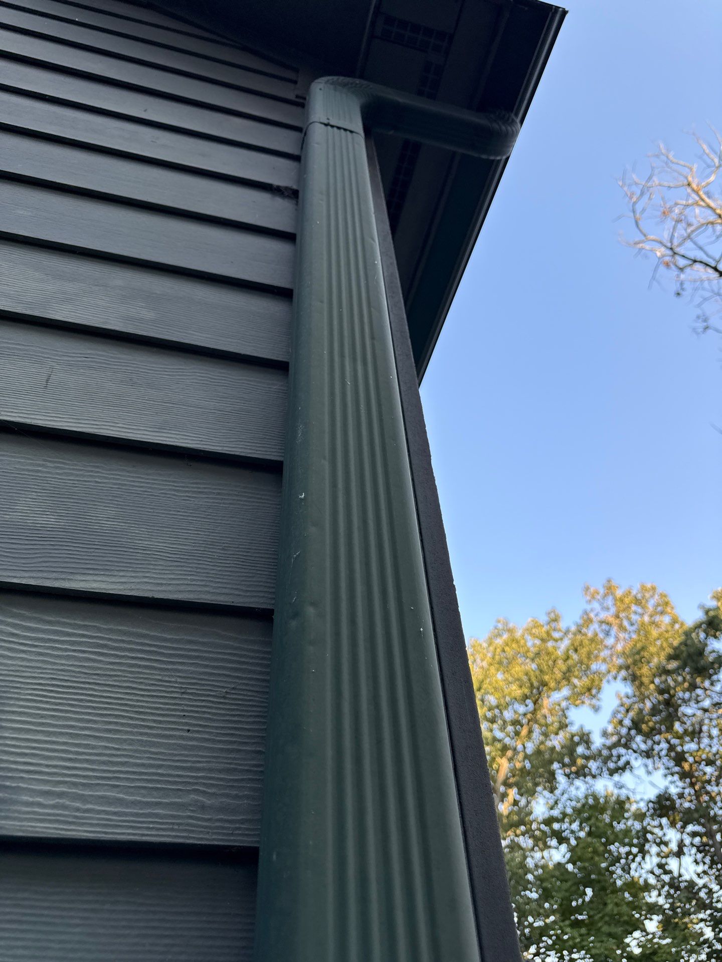 Custom Green Downspout Installation and Exterior Drainage in Pegram by Stellar Roofing & Restorations 