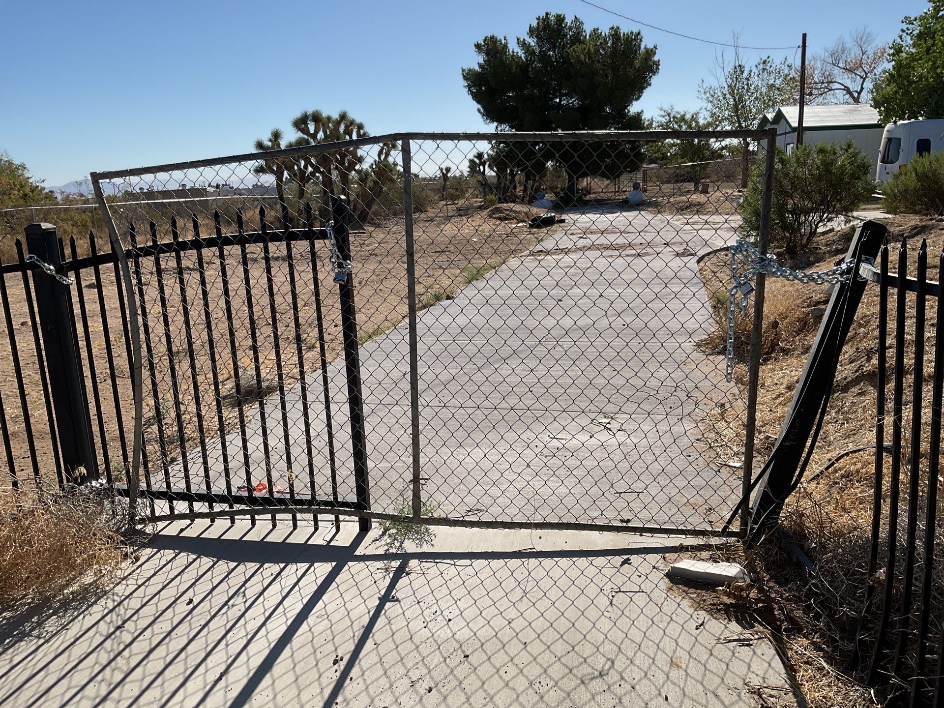 Gate installation using Wrought Iron by Fence Guys Inc. 