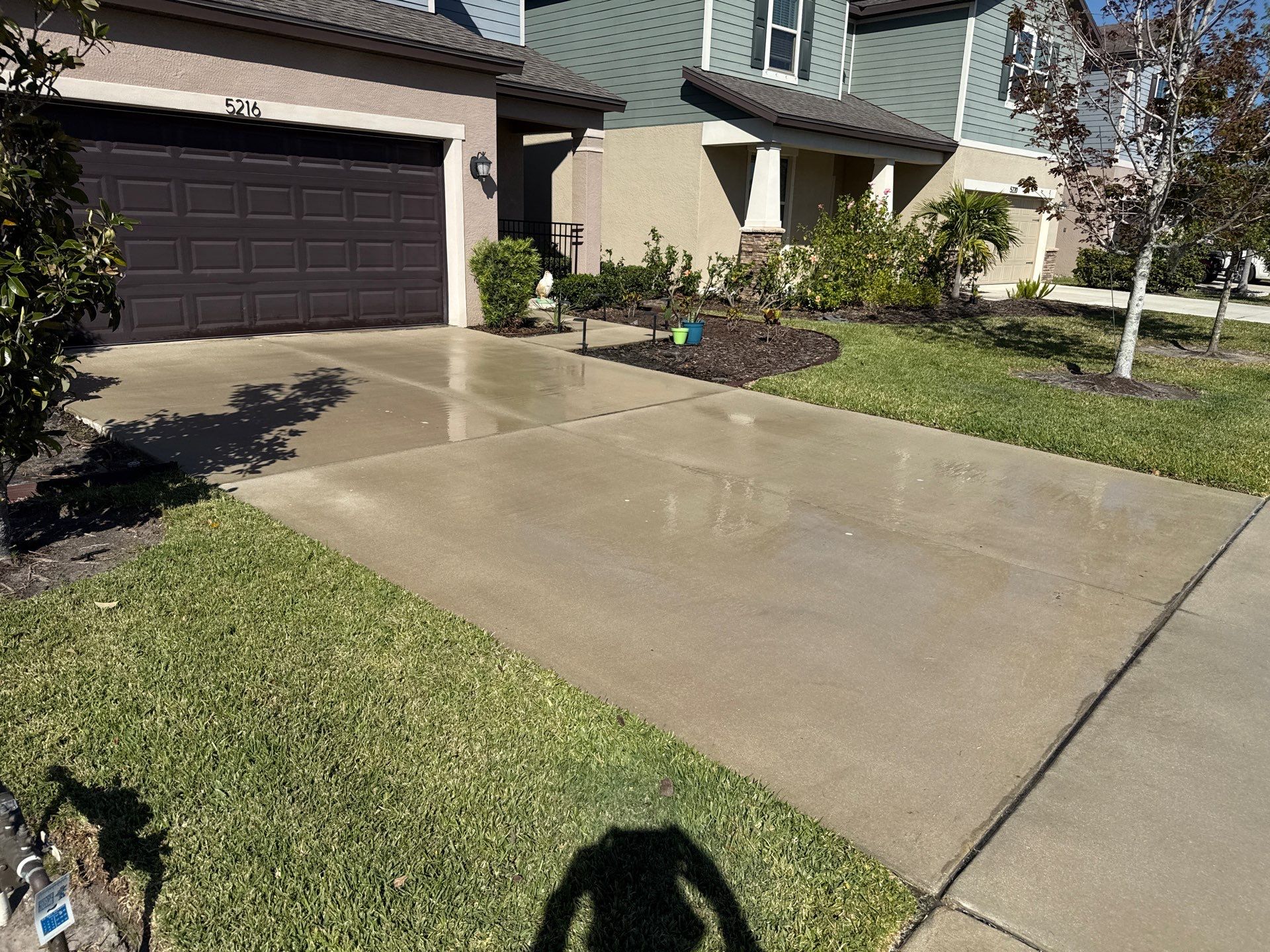Painted Lanai Floor, Screen Enclosure, and Driveway Cleaning in Trevesta Community, Palmetto, FL by Sunshine AquaWash