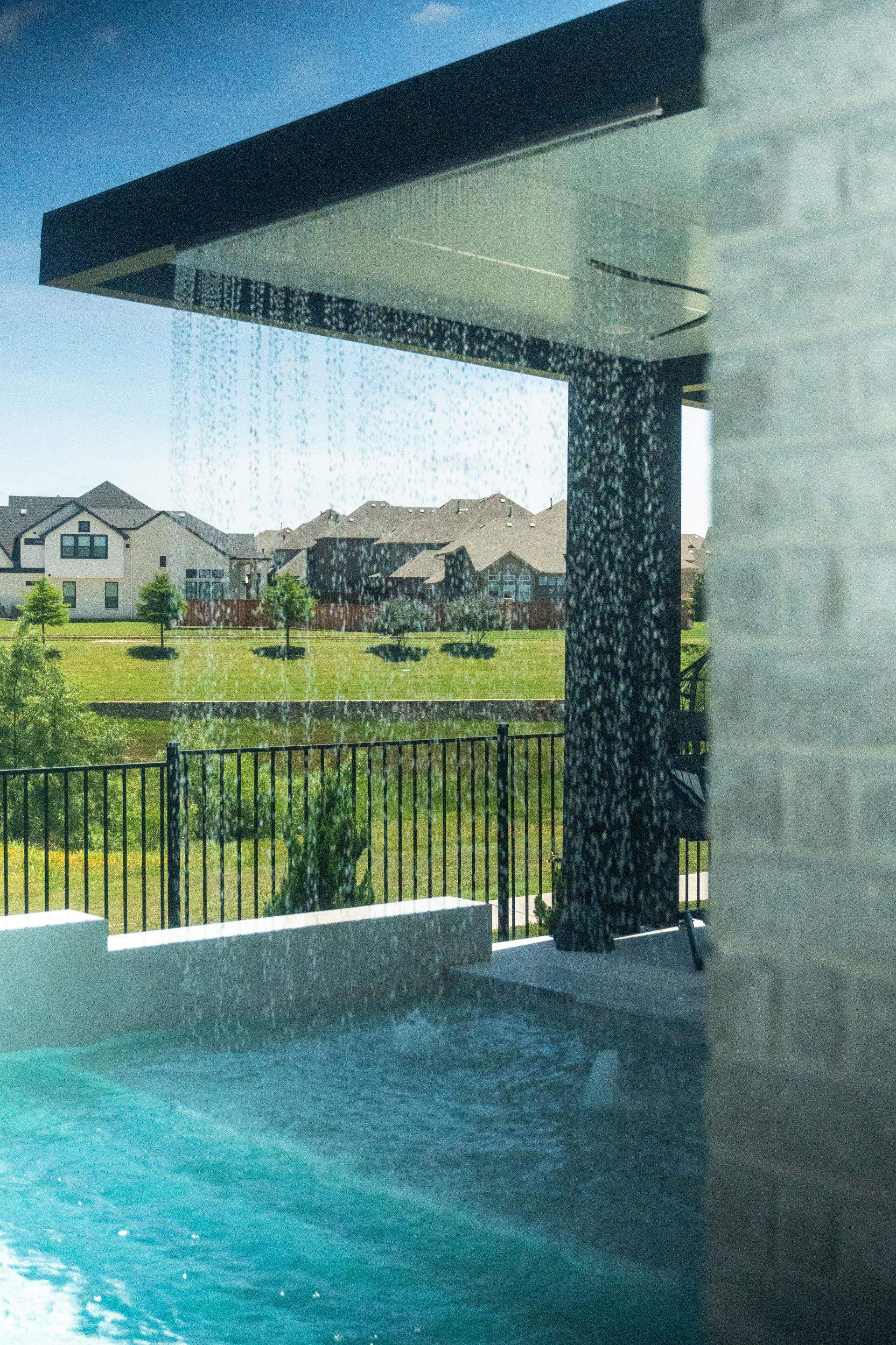Large Pool and Spa with Rain Descent by Pinnacle Pools and Spas - DFW