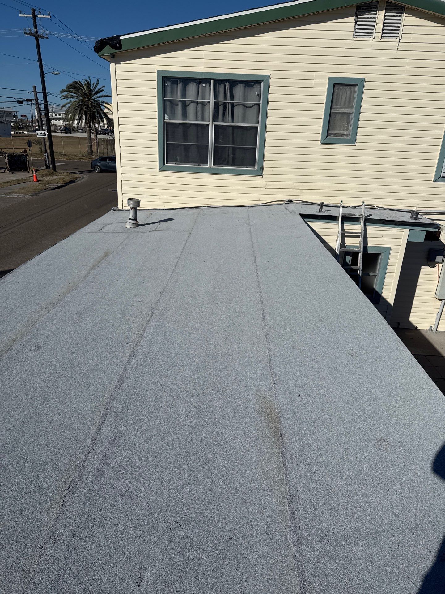 Mustang Island Flat Top by Bayfront Roofing and Construction