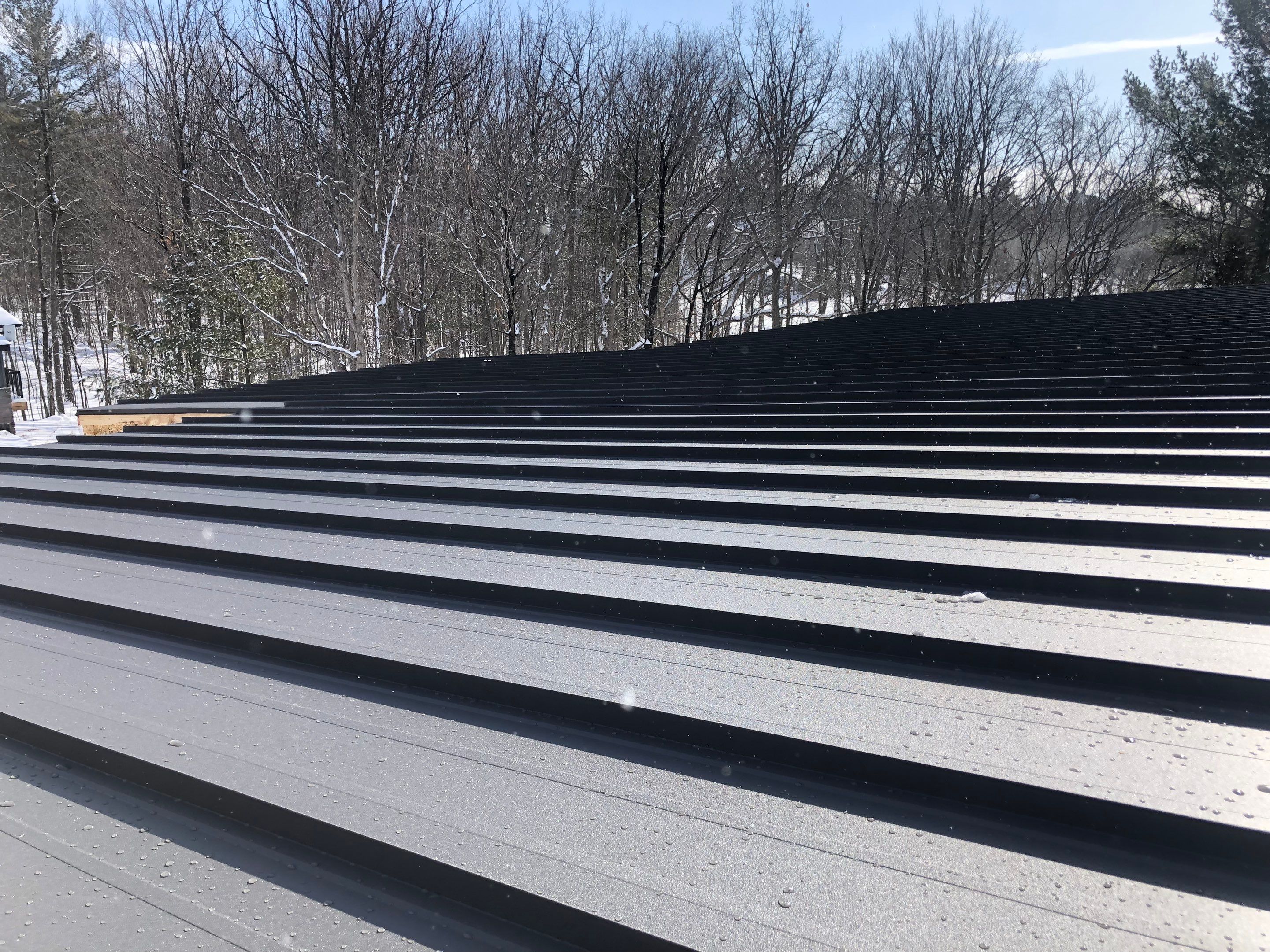 New Home Construction using 16" Standing Seam Panels by Jay Carter Roofing & Sheet Metal