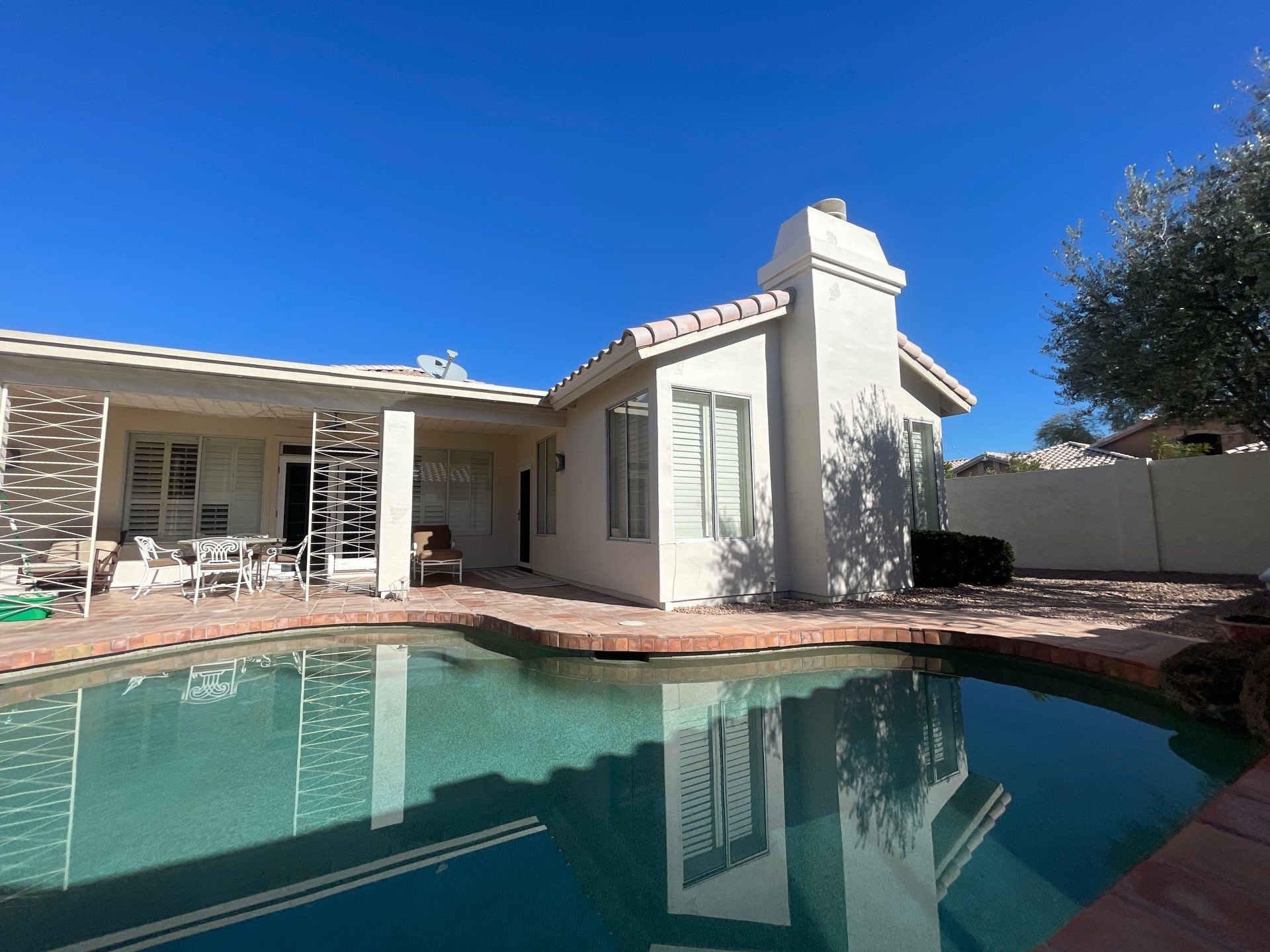 Gazzo - A Beautiful Home Exterior Transformation in Scottsdale, AZ with C&M Primer and Sherwin Williams Paints by Double G Painting Contractors, LLC
