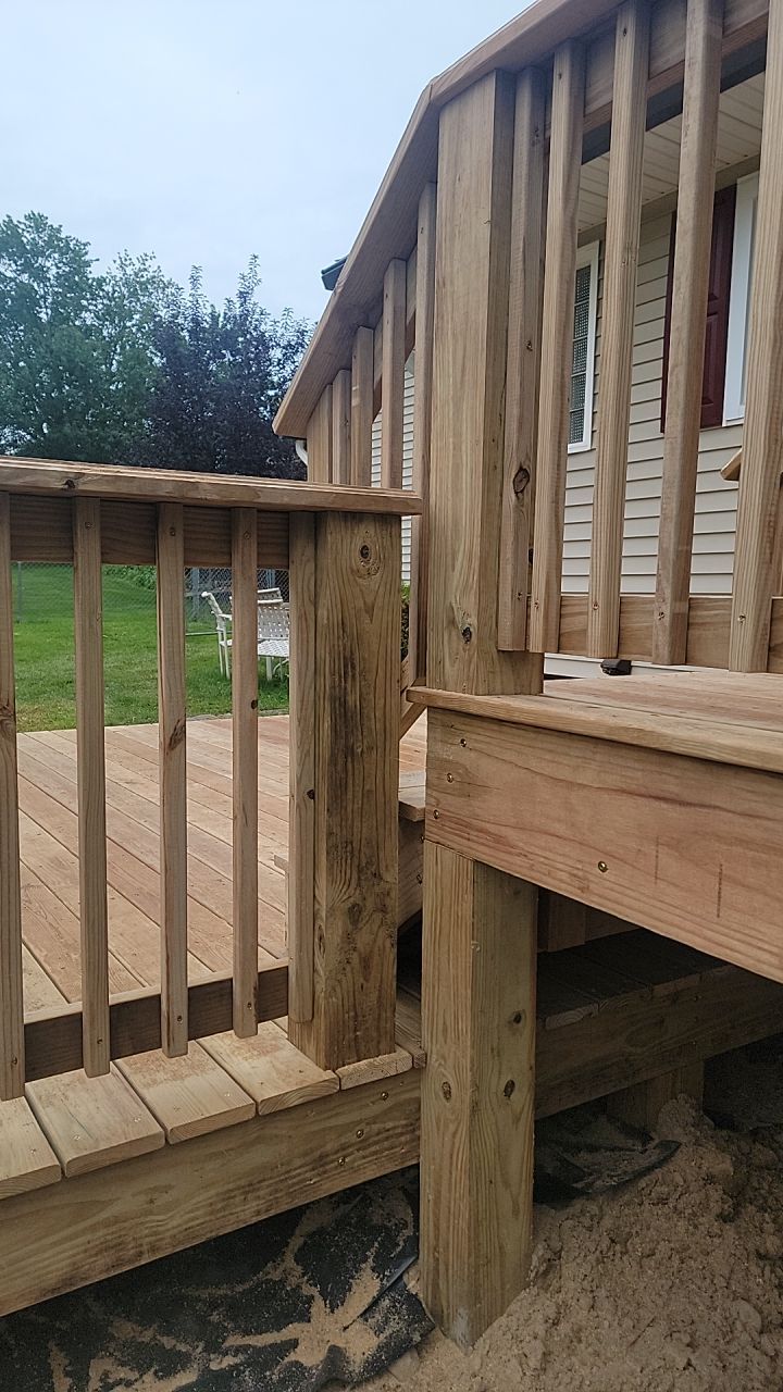 Deck Installation using Treated Lumber by Avalon Roofing and Exteriors