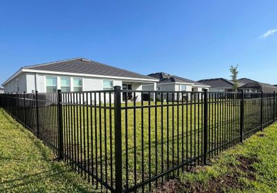 Aluminum Fence Installation using Black 3 Rail Aluminum Fence