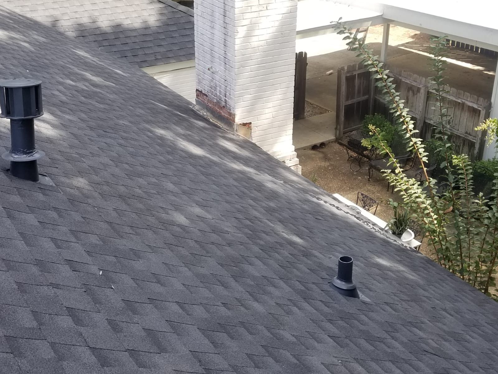 Residential Roofing Installation using Roof Replacement by American Roofing & Construction LLC