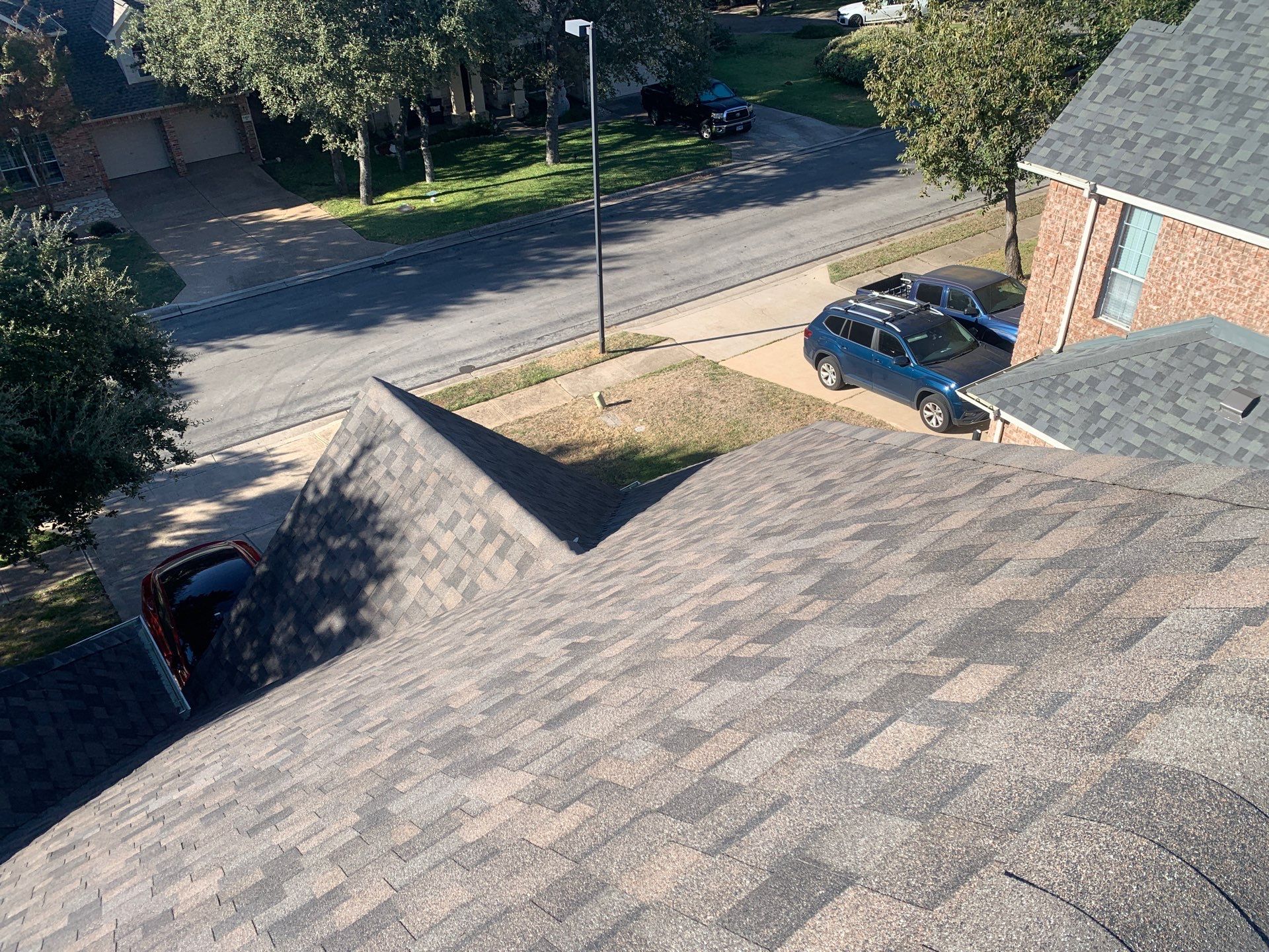 Hail Damage Restoration and Asphalt Shingle Roof Replacement in Austin by Caliber Restoration LLC