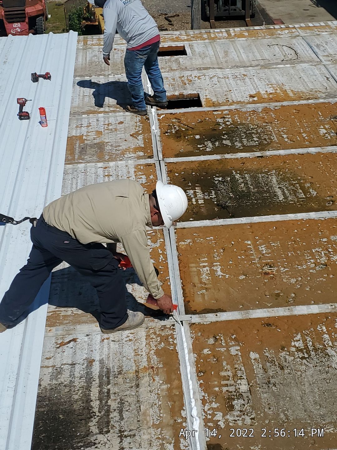 Commercial Roofing Installation using Aluminum Roofing panels by Hostetler Roofing