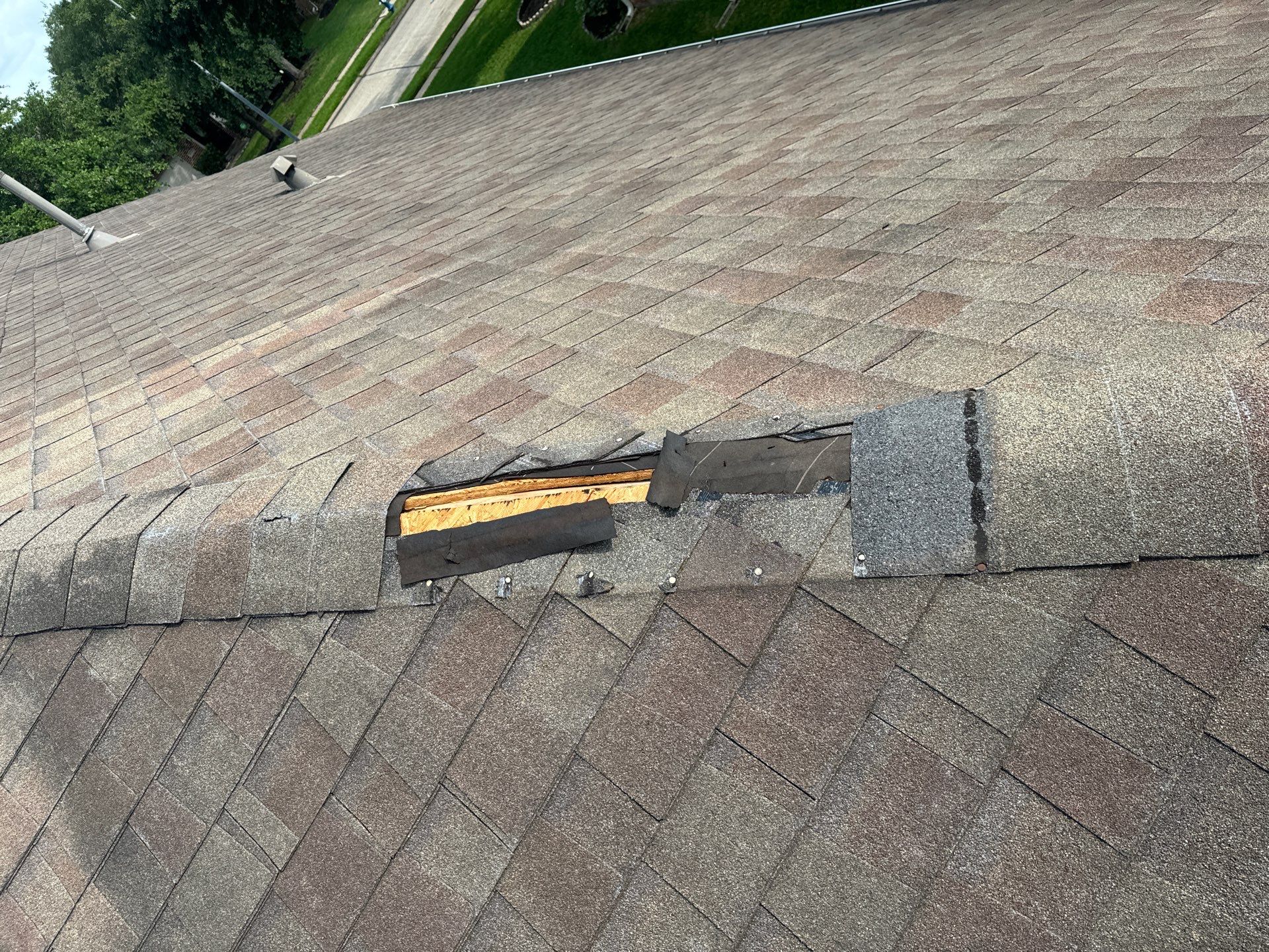 Hail Damage using Owen's Corning Duration (Lifetime) Shingles by Roof Repair Company