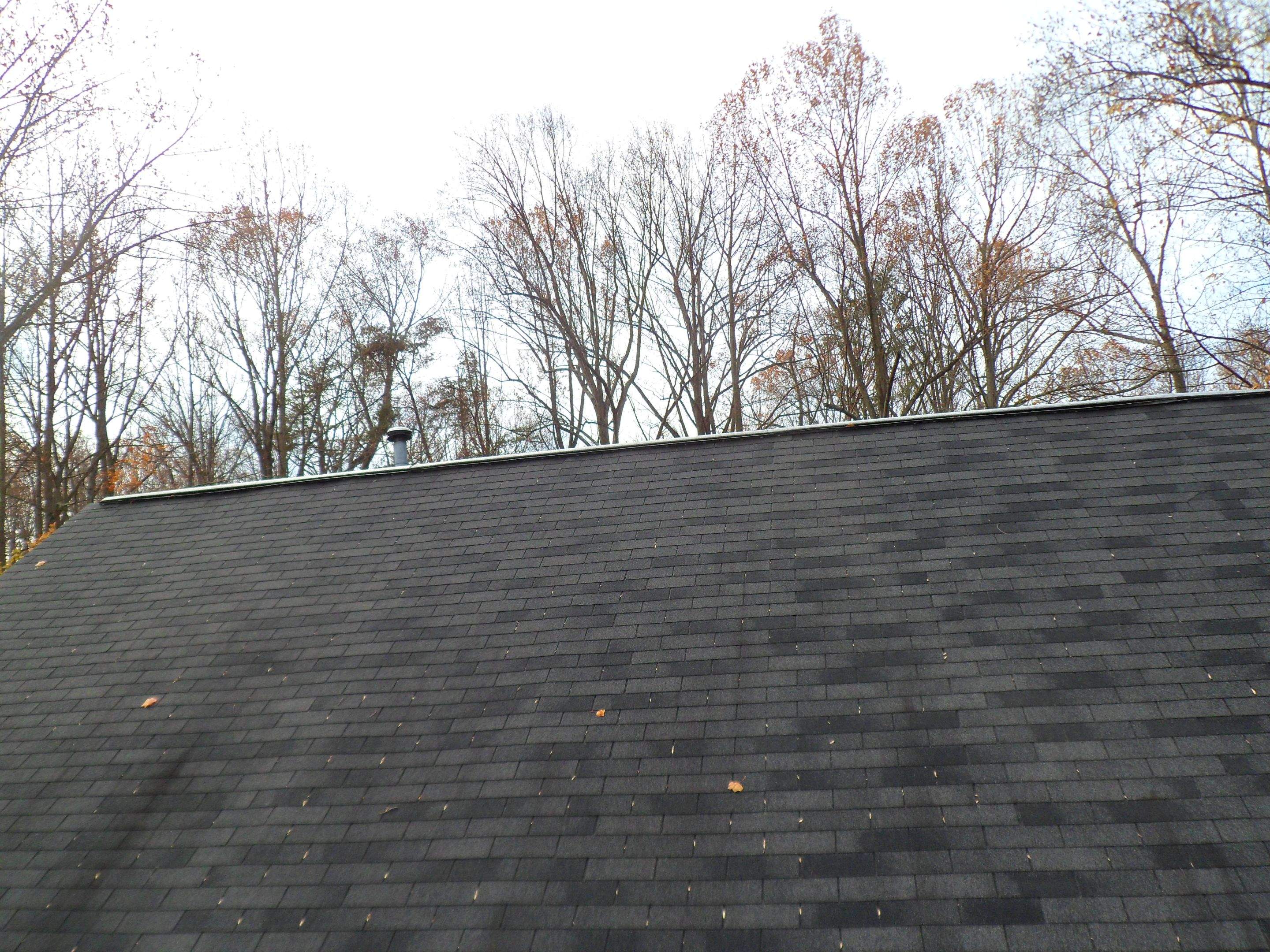 Residential Roofing Installation using Charcoal Black by Alpha Design Services